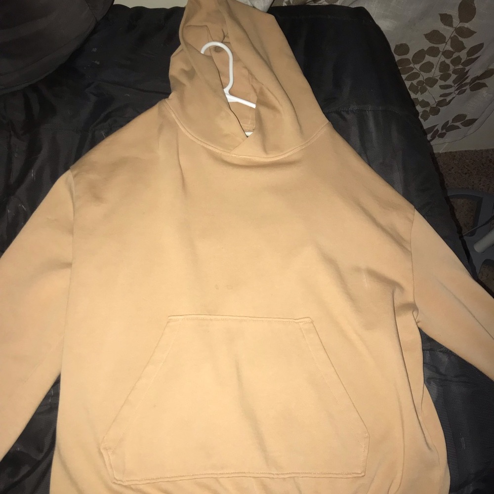 Tan size large urban outfitters hoodie.